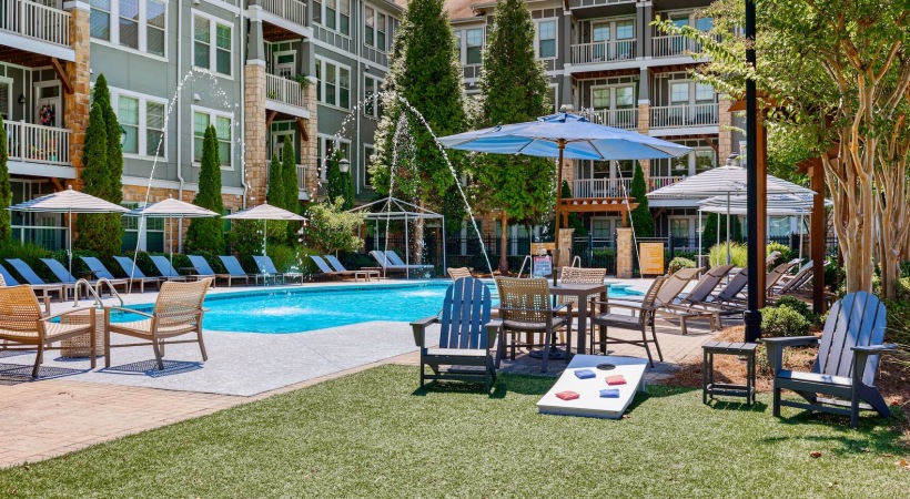 Expansive Pool and Cornhole area resort style pool