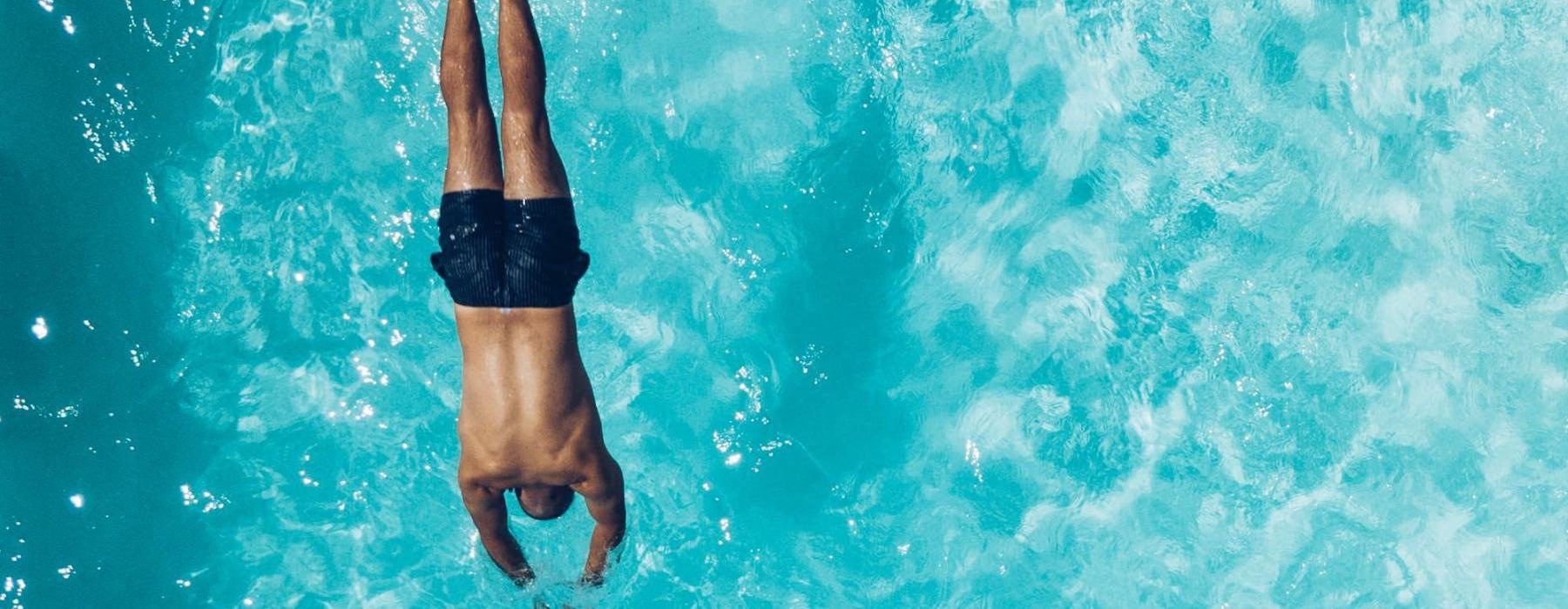 a man swimming in the water